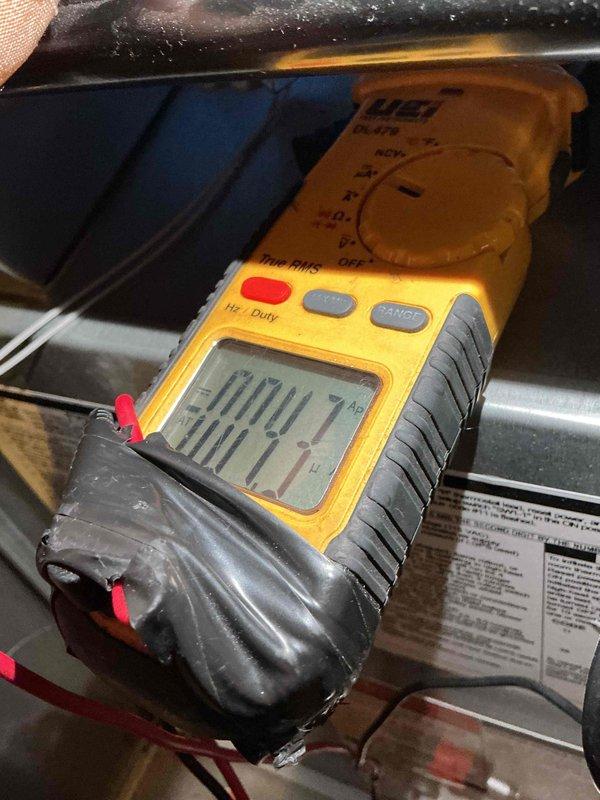 Completed comprehensive super tune maintenance service on residential HVAC system with unit located at side of home and air handler in basement. Replaced heavily soiled air filter that showed significant dust and debris accumulation with new filter to restore proper airflow and system efficiency. Performed electrical diagnostics using multimeter to verify proper voltage and amperage readings across system components, ensuring all electrical parameters were within manufacturer specifications.