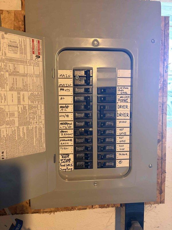 Responded to service call for loose hanging light fixture and microwave circuit breaker tripping issue. Secured electrical fixture that had come loose from ceiling box when customer attempted to change lightbulb, ensuring proper mounting and safe operation. Investigated microwave circuit breaker tripping problem and determined breaker required replacement due to failure under load, as customer had previously replaced microwave with no resolution. Replaced faulty circuit breaker in main electrical panel and verified proper operation of microwave circuit under full load conditions.