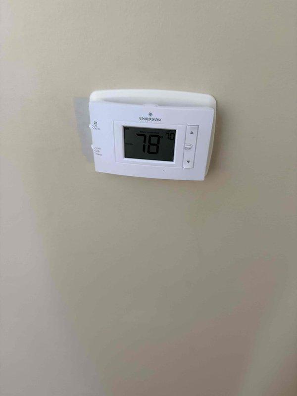 Responded to no cooling complaint on 2-year-old unit in basement. Found heavily clogged air filter restricting airflow, causing system to blow warm air. Replaced dirty filter with new filter, restoring proper airflow and cooling operation. System returned to normal function with adequate airflow and proper temperature output at thermostat reading 78°F.