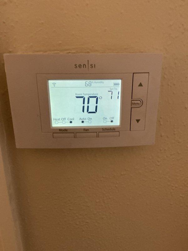 Completed comprehensive cooling maintenance on 7-year-old Bryant system that had not been serviced in approximately two years. Performed standard tune-up protocol including coil cleaning, system inspection, and verification of all operating parameters. System found to be functioning properly with thermostat displaying 70°F and all components operating within normal specifications.