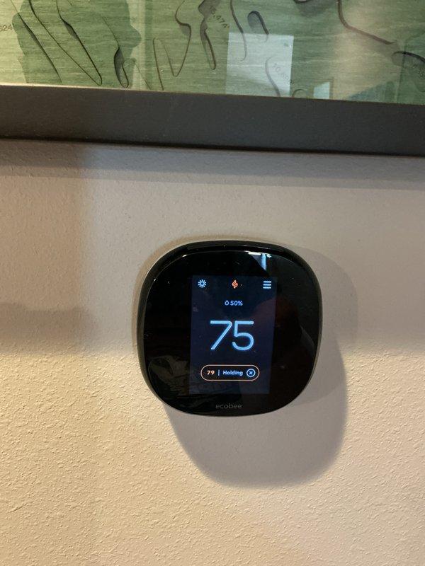 Completed preventive maintenance tune-up on basement furnace unit. Performed comprehensive system inspection, checked and cleaned air filter in the air handler assembly, verified thermostat operation and calibration on ecobee smart thermostat displaying proper temperature control at 75°F. All components functioning within normal operating parameters with no issues identified.