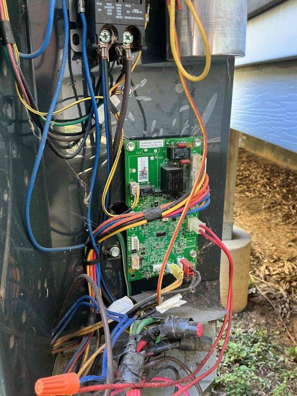 Replaced defective defrost control board on heat pump system to restore proper heating operation. Removed failed board from outdoor unit control panel, installed new replacement board, reconnected all electrical connections including relay wiring and sensor leads, and verified proper system operation. Defective board was removed from site per standard disposal procedures.