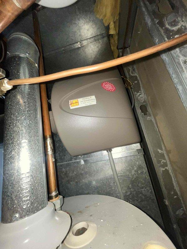 Completed heating maintenance tune-up on 12-year-old furnace system. Performed comprehensive inspection of all heating components, verified thermostat operation at 71 degrees, inspected ductwork and condensate drain system in attic installation, and confirmed all equipment operating within normal parameters. System found in proper working condition with no repairs required at this time.