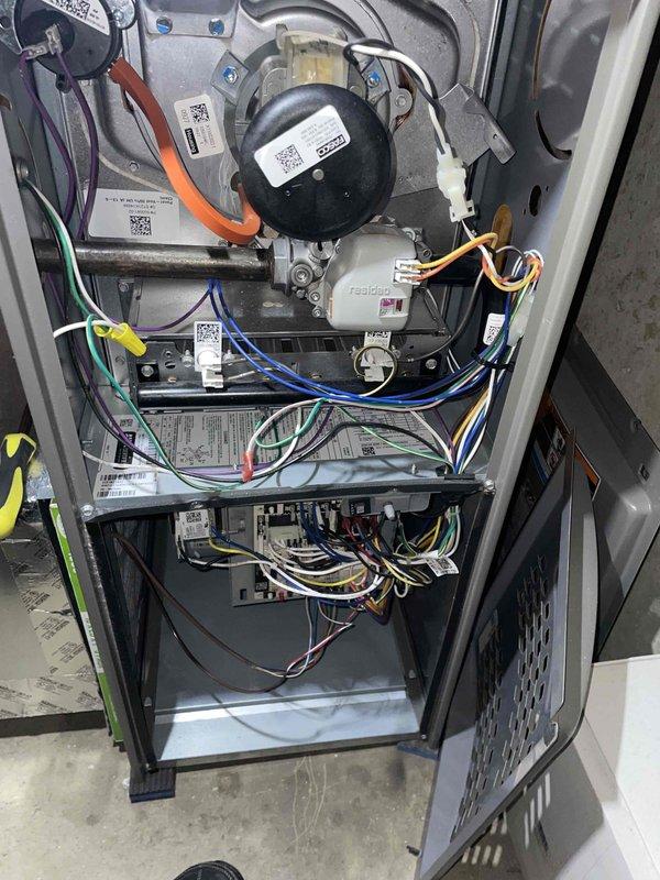 Completed full heating tune-up on 4-year-old furnace unit located in basement. Performed comprehensive system inspection, verified thermostat operation at 65°F setpoint, checked all electrical connections and wiring throughout unit, inspected compressor and condensate system components, and confirmed all safety controls functioning properly. Unit operating within normal parameters with no issues found.