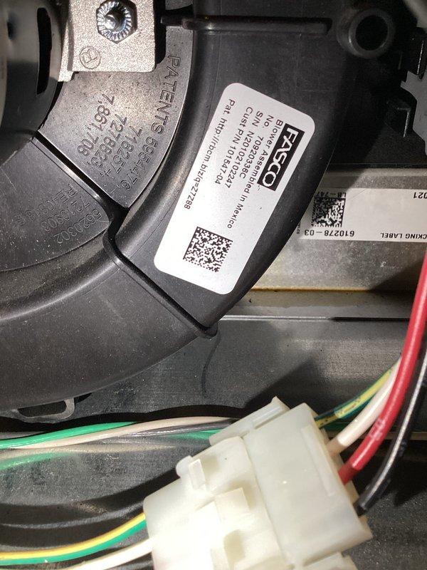 Responded to error message regarding pressure switch calibration failure on basement furnace unit. Upon inspection, diagnosed faulty blower motor assembly causing improper airflow and preventing pressure switch from calibrating correctly. Replaced FASCO blower motor, reconnected electrical wiring harness, and verified proper operation of all motor terminals and connections. System tested successfully with pressure switch now calibrating within manufacturer specifications.