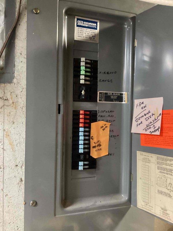 Provided estimate for removal and replacement of existing bathroom exhaust fan. Inspected electrical panel to verify circuit availability and breaker capacity for fan installation. Documented current electrical panel configuration showing Siemens main service panel with multiple circuit breakers and existing labeling system. Assessed wiring routing options through accessible basement/utility area for new fan circuit connection.