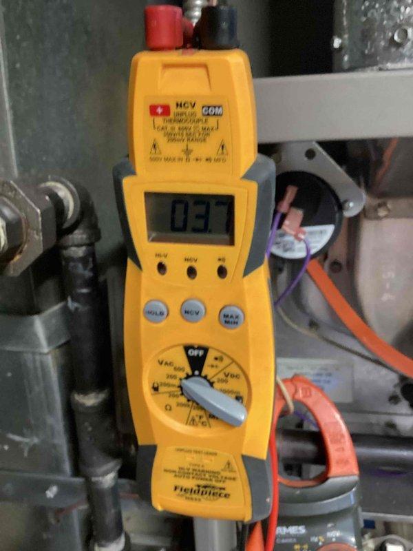 Completed comprehensive heating tune-up on basement furnace unit, performing standard O10 maintenance protocol. Conducted electrical diagnostics using clamp meter and multimeter to verify amperage draws and system voltage readings, confirming all electrical components operating within manufacturer specifications. All safety checks passed, system tested and left in proper working condition.