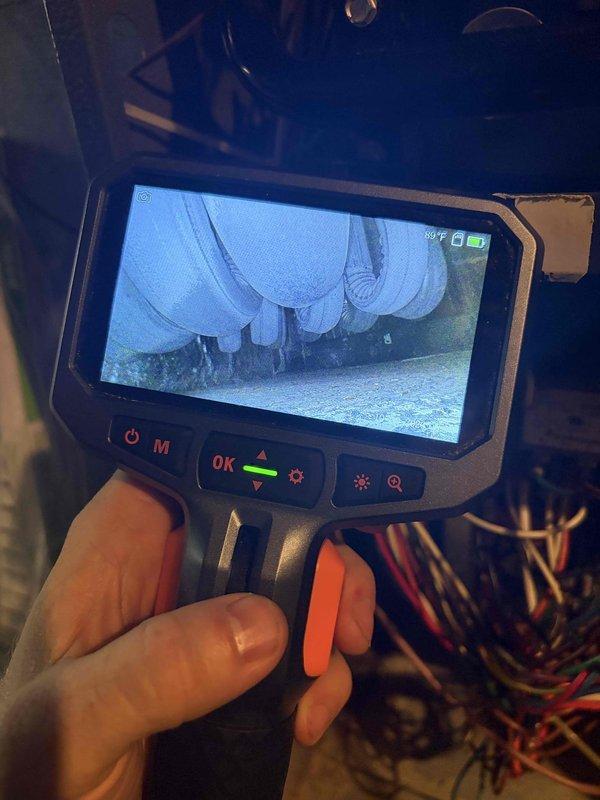 Completed comprehensive heating tune-up on 10-year-old furnace located in basement. Performed thorough system inspection using borescope camera to examine internal ductwork and heat exchanger components, and utilized clamp meter to verify electrical current draw and system amperage readings. All measurements were within normal operating parameters, and unit is functioning properly for the heating season.