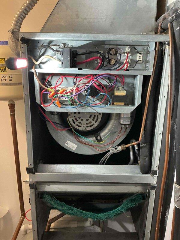 # HVAC Service - Tune Up U10 - Heating

Completed comprehensive heating tune-up on furnace unit located in utility closet. Performed full system inspection including internal components, electrical connections, blower motor assembly, and control board functionality. Verified thermostat operation displaying 74°F and confirmed proper communication between thermostat and heating system. All wire connections, relays, and contactors inspected and found secure with no visible wear or damage. Blower motor and wheel examined for proper operation and clearances. System tested and operating within normal parameters with no issues identified.