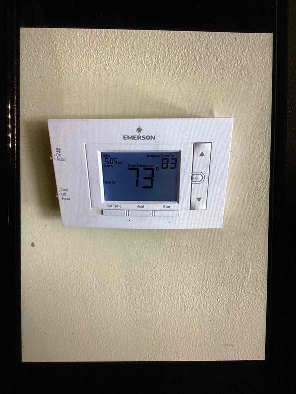 Completed comprehensive heating system tune-up on under 10-year-old unit located in basement. Performed full system inspection including internal heat exchanger examination using borescope camera to verify structural integrity and identify any signs of corrosion or deterioration. Verified thermostat operation and temperature calibration, confirming proper communication between control system and heating equipment with unit cycling correctly in heat mode.