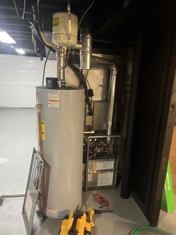 Completed comprehensive AC tune-up and maintenance on residential cooling system per customer request. System was operational upon arrival with equipment replaced within the last decade. Performed standard preventive maintenance procedures including inspection of all major components, verified thermostat operation and calibration at 73 degrees, and assessed furnace unit condition in basement utility area. All equipment found to be functioning within normal parameters with no immediate service concerns identified.