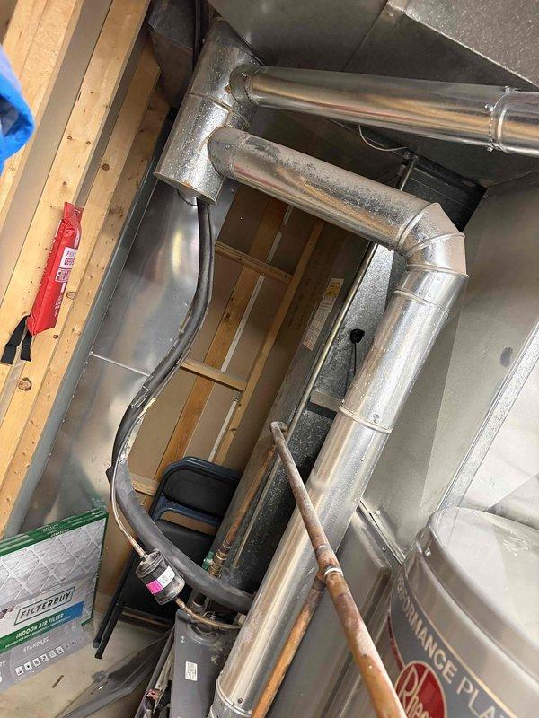 Completed comprehensive heating tune-up on 11-year-old furnace system in residential basement installation. Performed standard maintenance protocol including inspection of heat exchanger, burner assembly, and venting system; verified proper operation of blower motor and cleaned components as needed; tested safety controls and confirmed all systems operating within manufacturer specifications.