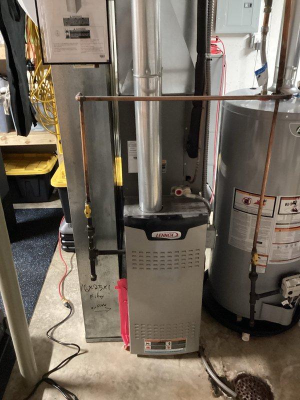 Completed comprehensive heating tune-up on 3-year-old Lennox furnace located in basement. Performed full system inspection including temperature differential testing, verified proper airflow through heat exchanger, inspected all electrical connections and wiring, checked gas pressure and burner operation, and examined venting system integrity. All components found operating within manufacturer specifications with no deficiencies noted.