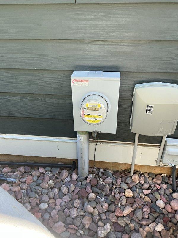 Relocated electrical junction box from behind built-in stove area to adjacent cabinet location to accommodate new kitchen cabinet and stove installation. Verified proper circuit identification at main electrical panel and ensured all connections met code requirements for cooktop circuit accessibility and safety.