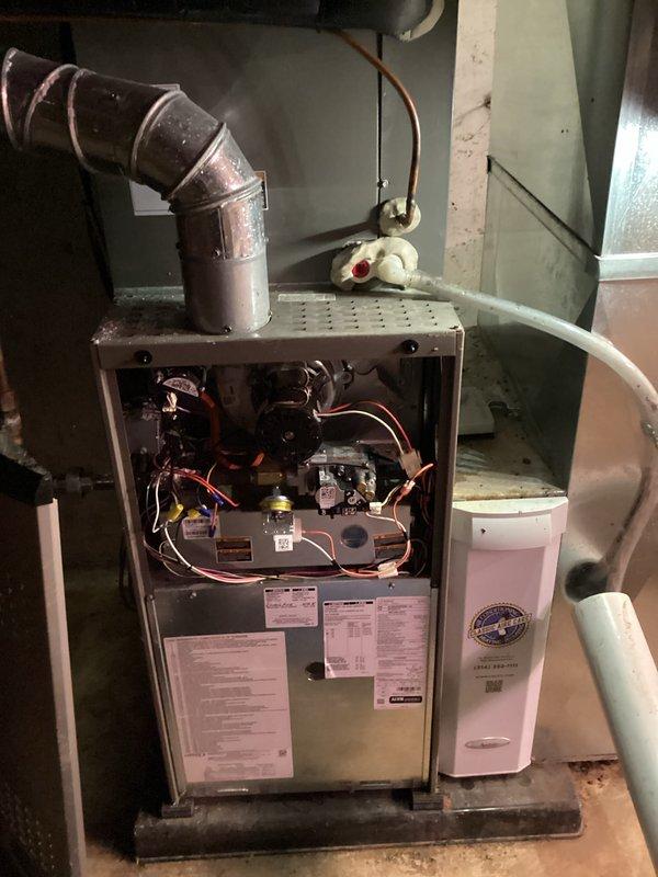 Completed comprehensive heating maintenance tune-up on 9-year-old system that had not been serviced since original installation in 2019. Performed full inspection of furnace components including motor assembly, electrical connections, circuit boards, and control mechanisms with all systems found operating properly. Conducted internal ductwork inspection using borescope camera which revealed moderate dust and debris accumulation on interior surfaces, recommended duct cleaning for improved air quality and system efficiency.