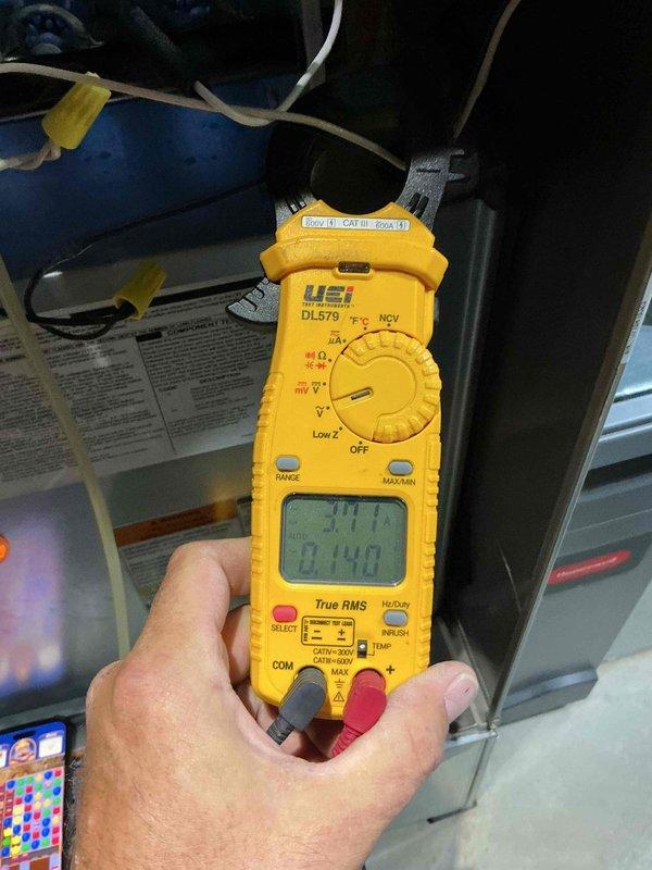 Completed comprehensive heating tune-up on basement furnace unit over 10 years old. Performed diagnostic testing using digital clamp meter to verify electrical readings and system amperage, confirming proper operation of all heating components. All measurements within normal operating parameters; system operating efficiently with no issues identified.