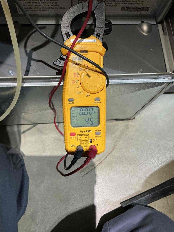Completed comprehensive heating tune-up on basement furnace unit over 10 years old. Performed diagnostic testing using digital clamp meter to verify electrical readings and system amperage, confirming proper operation of all heating components. All measurements within normal operating parameters; system operating efficiently with no issues identified.