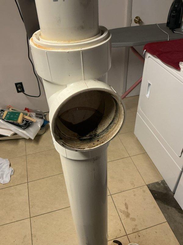 Responded to report of slow-draining basement floor drain. Transported drain cleaning equipment through interior of home to basement level due to lack of exterior yard access. Upon inspection, identified partial obstruction in main drain line causing reduced flow capacity. Performed mechanical cable cleaning of basement drain system to remove buildup and restore proper drainage. Verified full flow restoration upon completion of cleanout procedure.