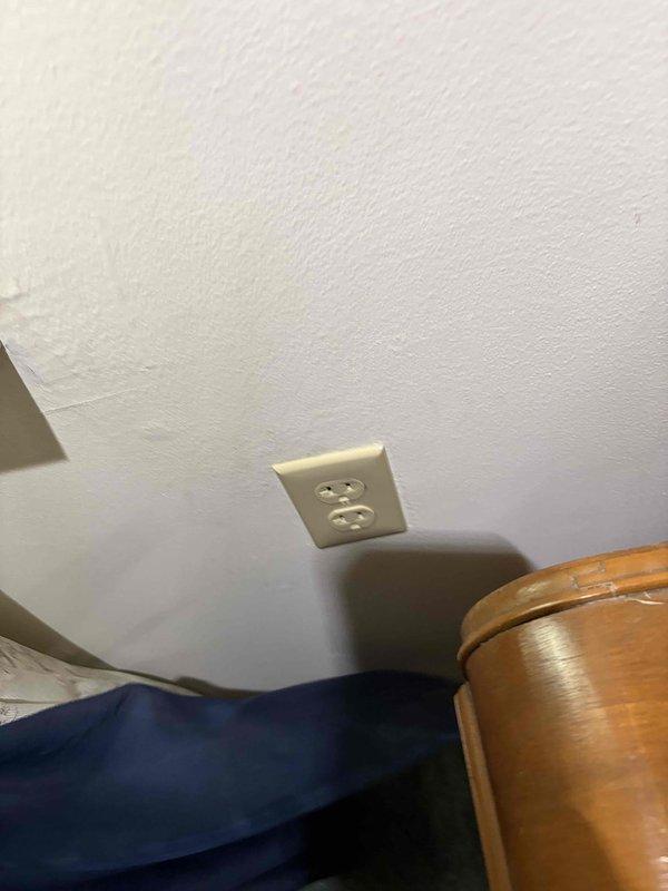 Completed electrical rewire installation including installation of new duplex receptacle outlets in multiple locations throughout the property. Installed code-compliant beige duplex receptacles on ceiling and wall surfaces with proper grounding and secure mounting to existing electrical boxes.