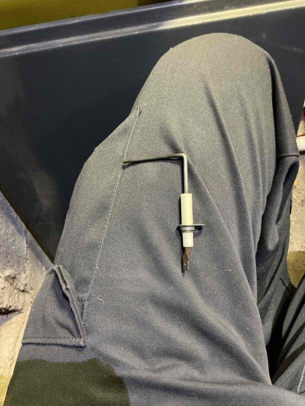 Performed a heating tune-up on one gas furnace, removing the access panel to inspect the burner compartment, gas valve assembly, and wiring connections. Cleaned and serviced the flame sensor and ignition components, and verified proper furnace operation.