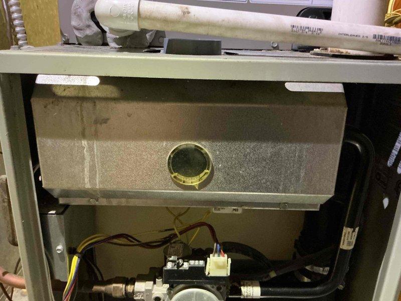 Performed a heating tune-up on one gas furnace, removing the access panel to inspect the burner compartment, gas valve assembly, and wiring connections. Cleaned and serviced the flame sensor and ignition components, and verified proper furnace operation.