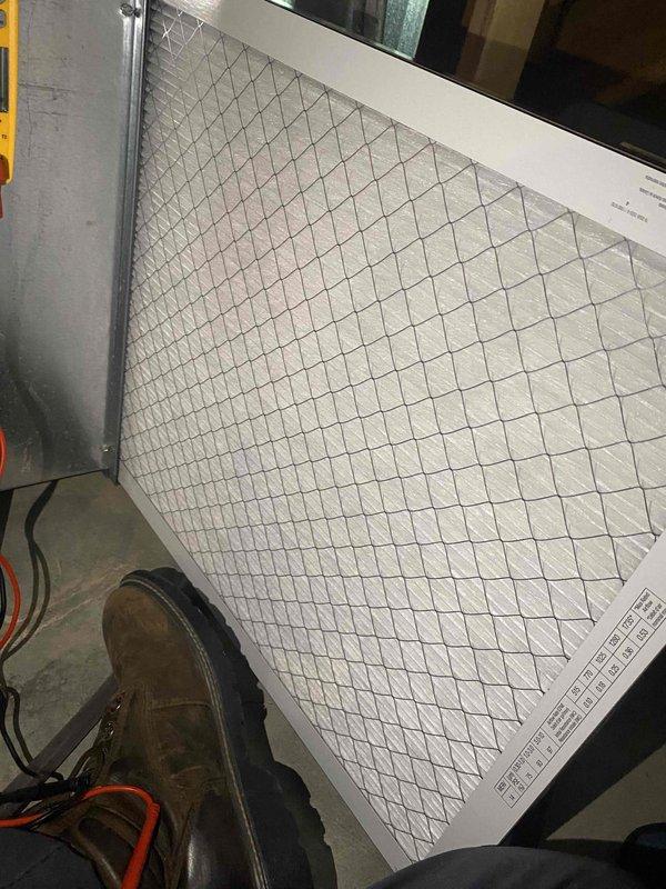 Performed a heating tune-up on the furnace, including inspection of the blower and air handler cabinet, and verified electrical operation with a true RMS clamp meter, measuring approximately 6.2 A AC draw. Inspected the pleated return air filter and found it clean, with no visible damage, debris, or restriction. The system was left operating normally.