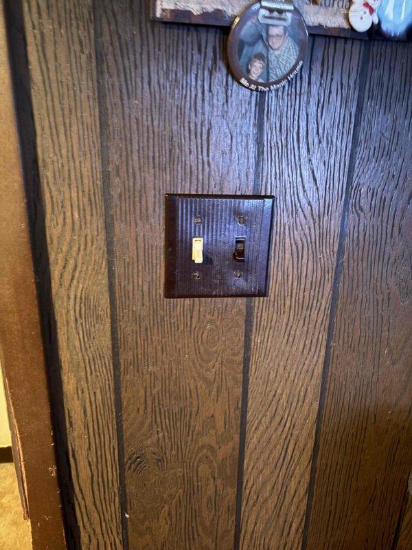 Replaced hardwired smoke alarms with customer-supplied units, securing each to its mounting base and labeling the installation date on the unit. Inspected and addressed the non-functioning wall switches at the double-gang switch plate, verifying proper operation and a secure, intact cover plate.