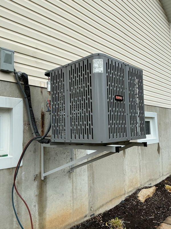 Replaced the failed compressor on the outdoor condensing unit under manufacturer parts and labor warranty, with the original unit retained per warranty requirements. After the swap, connected a digital manifold gauge set and verified system operation on R410A, with suction and discharge pressures stable and the unit running properly in both heating and cooling modes.