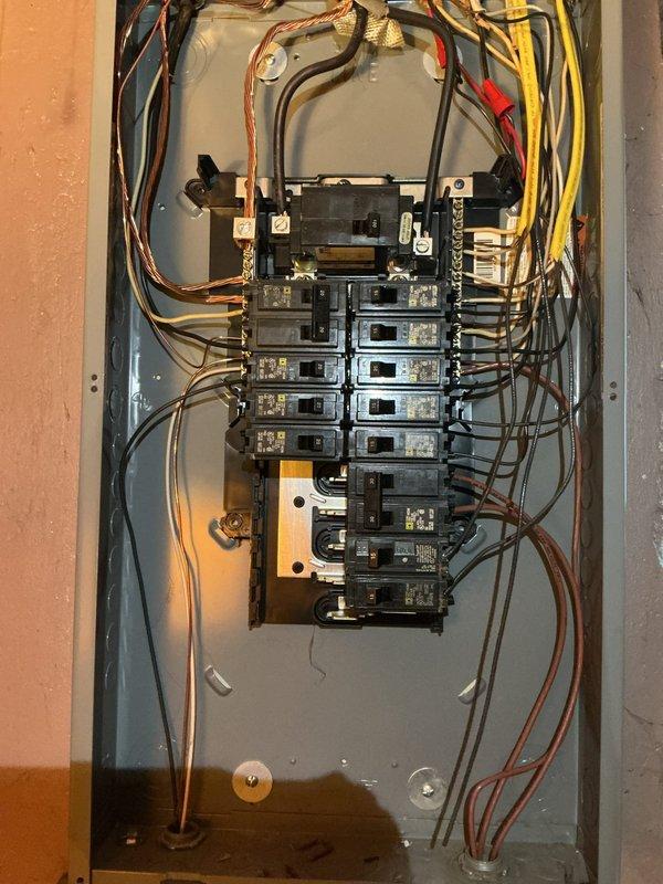 Responded to a partial circuit power loss, inspected the main service panel and branch circuit breakers, and traced the affected circuit to a GFCI receptacle that was loose and not seated flush in a damaged wall opening. Inspected the receptacle wiring and connections for faults or loose terminations, and restored power to the affected circuit. Note that the drywall around the device is torn, and the receptacle remains without a cover plate and requires proper securing and wall repair.