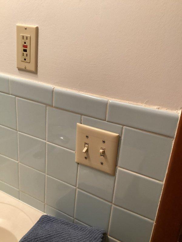 Installed a new bathroom exhaust fan in the ceiling, replacing the existing fan housing that was clogged with dust and debris. Secured the unit flush to the textured ceiling, completed the electrical connections, and tested the fan for proper operation and airflow.