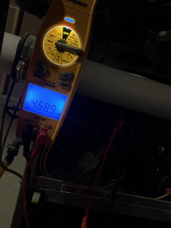 Performed a tune-up on one gas furnace, including inspection of the electrical and gas connections and verification of the blower and control wiring. Tested the capacitor with a calibrated clamp multimeter, measuring approximately 4.7 µF, and checked amperage and voltage draw on the electrical components to confirm they were operating within manufacturer specifications. System was left in working order.