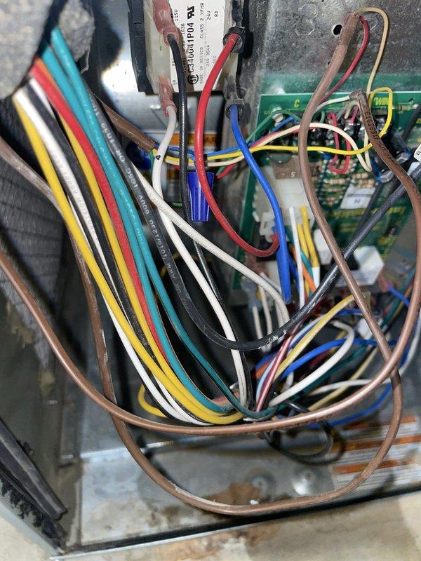 Diagnosed a thermostat with no power or display and a furnace running continuously by inspecting the low-voltage control circuit, including the 24V transformer, wiring connections, and control board. Verified the transformer and low-voltage wiring at the furnace control board, restored 24V power to the thermostat circuit, and confirmed the furnace now cycles on and off normally in response to thermostat calls for heat.