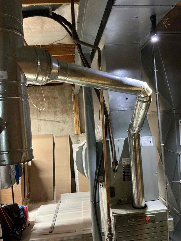 Performed a heating tune-up on two gas furnace units, including inspection of the burner assembly, flue venting, and heat exchanger, along with cleaning and testing of safety controls and ignition components. Verified proper combustion, draft, and airflow through the plenum and ductwork; no visible rust, frost, or damage was found, and both units were operating normally at completion.