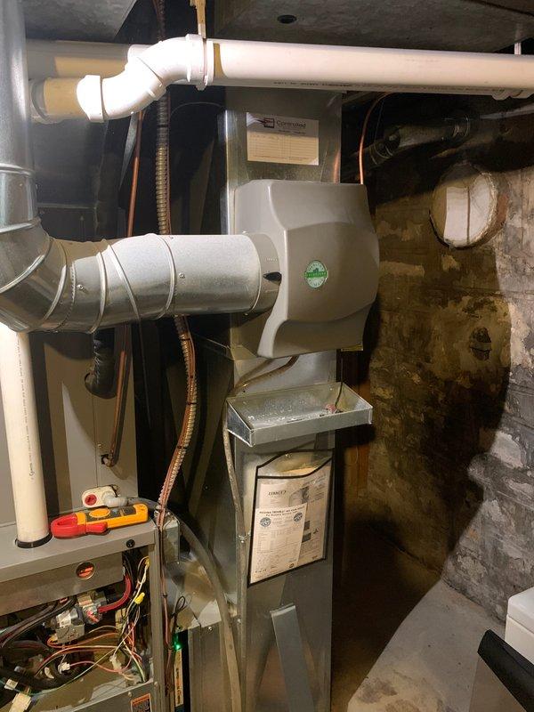 Performed a complete heating tune-up on a 10-year-old gas furnace, inspecting and testing the electrical controls, blower assembly, and gas components with a clamp meter to verify proper operation. Checked the attached bypass humidifier, supply plenum connections, and condensate/drain piping for proper function. System was operating normally at the time of service, and all components were left in working order.