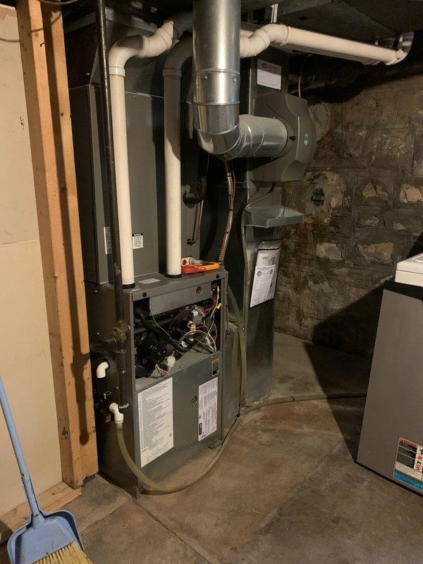Performed a complete heating tune-up on a 10-year-old gas furnace, inspecting and testing the electrical controls, blower assembly, and gas components with a clamp meter to verify proper operation. Checked the attached bypass humidifier, supply plenum connections, and condensate/drain piping for proper function. System was operating normally at the time of service, and all components were left in working order.