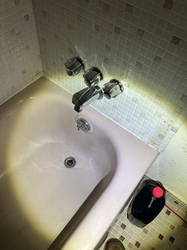 Cleared the clogged main bathroom tub drain, restoring proper flow and confirming unobstructed drainage through the tub spout and drain assembly. Inspected and repaired the kitchen sink sprayer, restoring normal operation and water pressure.