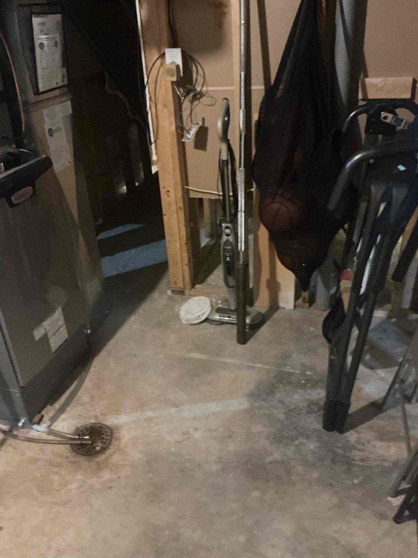 Returned to address a water heater pilot light repeatedly extinguishing. Inspected the installation in the utility area and performed draft/pressure testing with a digital manometer to evaluate venting and combustion air conditions as a potential cause of the pilot outage. Verified readings and system operation, and documented the findings with photos.