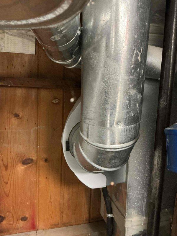 Performed a furnace tune-up on one unit, including inspection of the system, flue piping, and ductwork connections, which showed no rust, damage, or leakage. Removed the heavily soiled 20x25x4 pleated air filter and replaced it to restore proper airflow, and cleared the removed filter and debris from the work area.