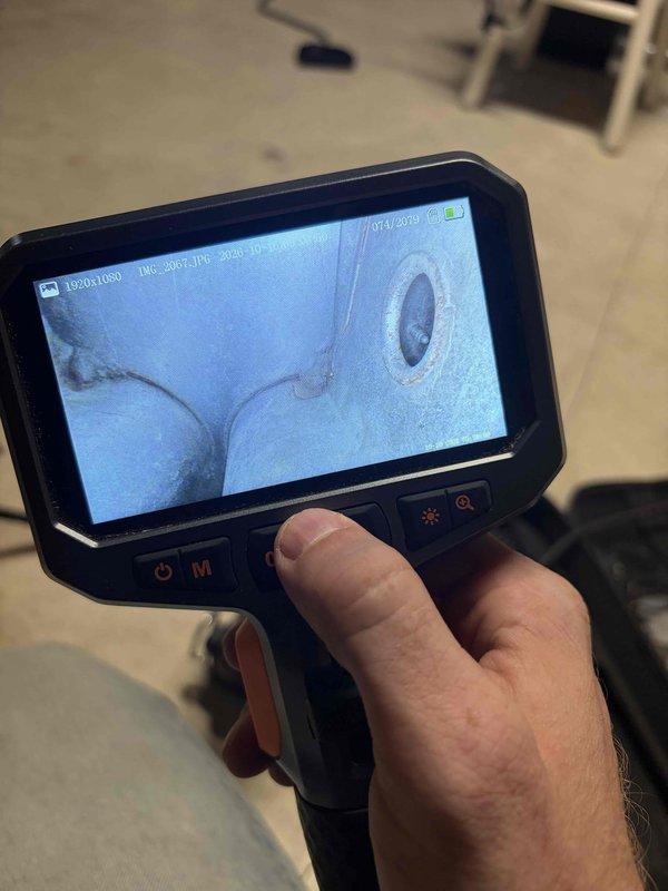 Performed a complete tune-up on one furnace, including a visual and borescope inspection of the heat exchanger interior, which revealed minor surface oxidation with no evident cracks or breaches. Verified safe and efficient operation of the heating system and documented the findings with inspection photos.