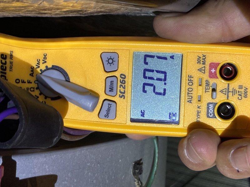 Performed a heating tune-up on one furnace, including electrical testing with a true-RMS clamp meter to verify amperage draw on the motor/control circuit, which measured approximately 2.07 A AC within normal operating range. Verified thermostat operation with the system switch set to heat and confirmed proper call for heat and calibration at a 72°F setpoint, with no abnormal conditions found. Unit operated normally at completion.