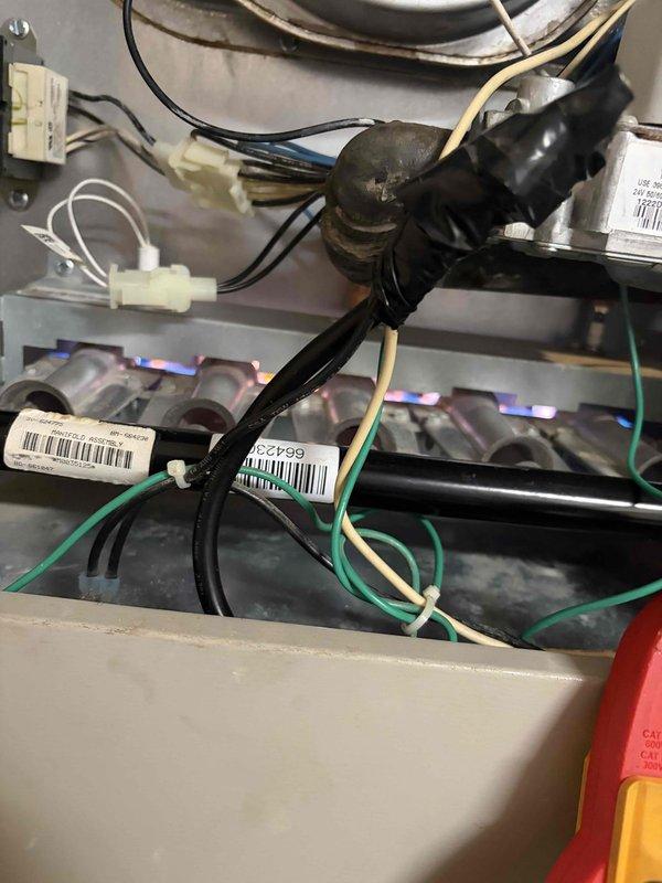 Performed a comprehensive Supertune maintenance service on two gas furnace systems under 10 years old, including inspection and replacement of the air filters, evaluation of the burner assembly and manifold, and verification of proper flame characteristics with stable blue flames across all burner tubes. Inspected the gas valve, control wiring, and electrical connections, noting worn wiring insulation and secured harnesses, and checked interior cabinet surfaces for dust buildup, corrosion, and cabinet panel paint deterioration. Systems tested for proper operation with combustion and performance readings taken using test instruments.