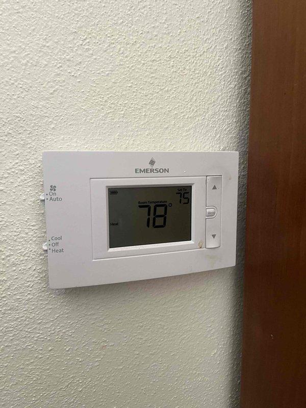 Performed a complete tune-up on the gas furnace, inspecting the burner assembly, flame sensor, igniter, and associated wiring connections. Verified proper ignition and stable blue burner flames across all heat exchanger ports, with a minor orange flicker noted on one burner that warrants monitoring. Tested thermostat operation and confirmed the system responds correctly to heat call, with the unit operating normally at completion.