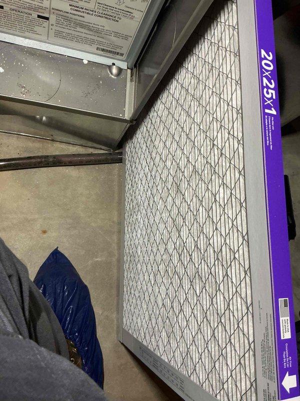 Performed a heating tune-up on a single furnace unit over 10 years old. Inspected the cabinet and interior components, replaced the air filter with a new 20x25x1 pleated filter to restore proper airflow, and used a clamp meter to measure electrical draw on the system's components. The system operated normally with no visible frost, rust, or damage observed.