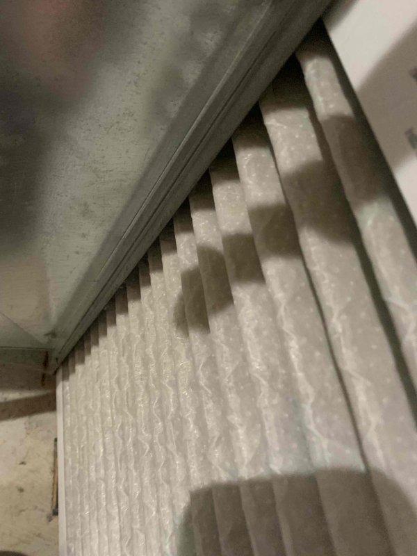 Performed a heating tune-up on one Trane upflow furnace/air handler, including inspection of the electrical compartment and amperage testing of components with a clamp meter. Inspected the return air filter and housing, confirming the pleated media was intact and lightly dusty with no tears. Verified condensate drain piping, ductwork connections, and refrigerant line insulation were in good condition, and the system was left operating properly.