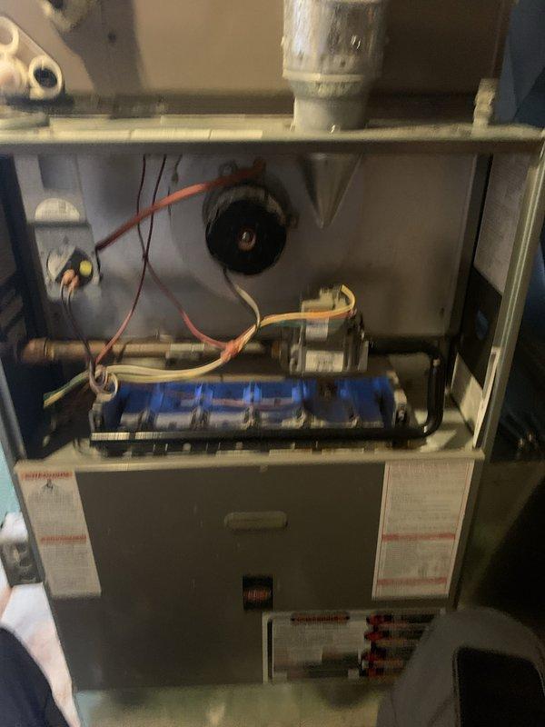 Performed a Supertune seasonal tune-up on two units, a gas furnace and an outdoor air conditioning condenser. Inspected the furnace burner assembly, gas valve, inducer/blower motor, flue connection, wiring, and limit controls, with no visible corrosion, wear, or damage found. Inspected the condenser grille and coil fins, cleared surrounding leaves and debris, and verified no coil damage or obstructions, leaving both systems in good working condition.