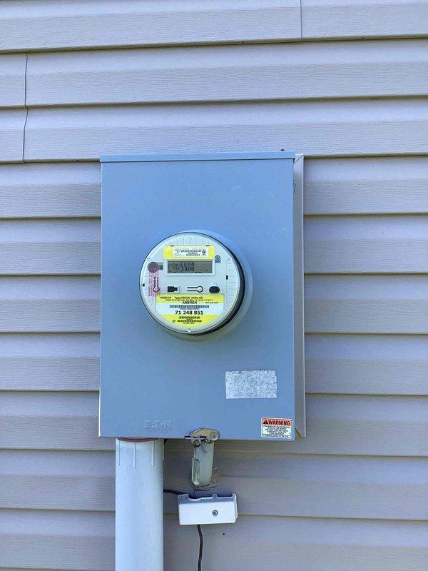 Responded to a no-power call following an outage in which a breaker tripped and several hard-wired kitchen appliances (disposal, dishwasher) and the septic alarm were affected. Inspected the main service panel and utility meter, verified circuit labeling and breaker positions including the kitchen GFCI and disposal/dishwasher circuits, and confirmed no visible damage, corrosion, or overheating at the panel or meter enclosure. Panel and service equipment appeared intact and in serviceable condition.