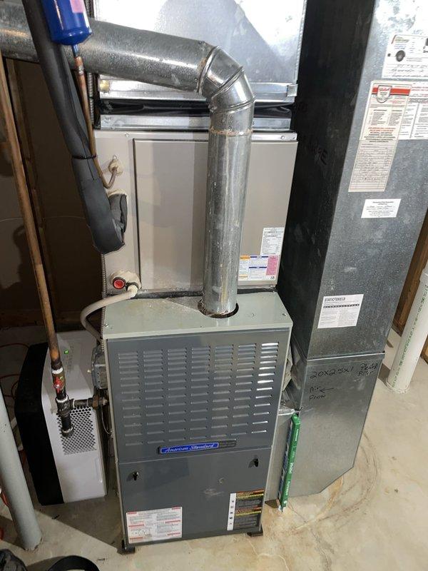 Performed a seasonal heating tune-up on a 10-year-old gas furnace, inspecting the unit, flue venting, and ductwork and confirming normal operation. The system was found in good working condition with no visible corrosion, leaks, or damage to the flue, ductwork, or condensate components. Verified thermostat operation and noted the active furnace maintenance reminder; the 20x25x1 return air filter size was documented for future replacement.