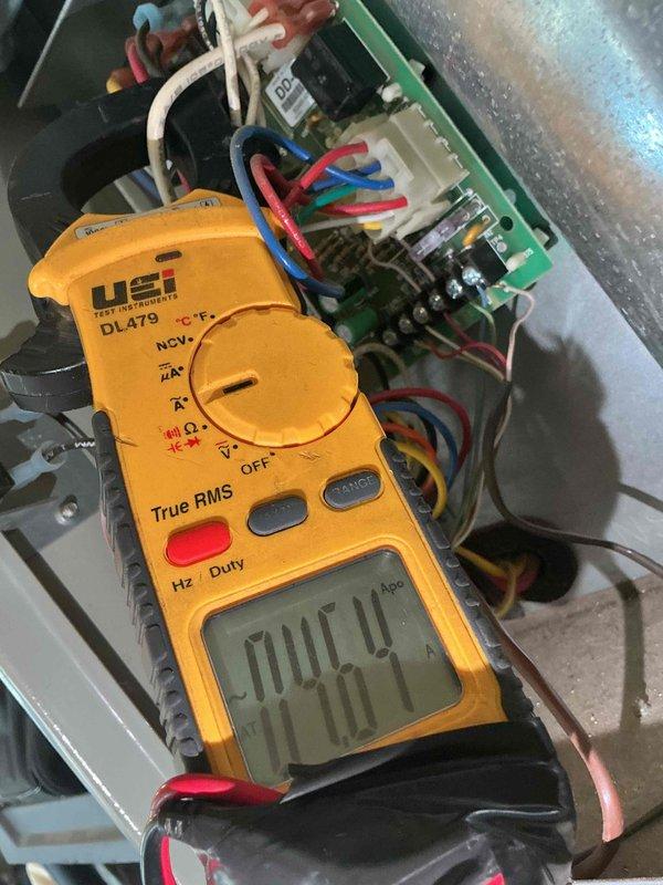 Performed seasonal heating tune-ups on two furnaces, inspecting the electrical and control compartments and verifying operating amperage with a true RMS clamp meter. Inspected the air filters, noting heavy dust and debris loading with a torn frame on one, and found damaged foil-faced insulation and tape at the cabinet opening; recommend filter replacement and repair of the cabinet insulation and seal to maintain proper airflow and prevent air leakage.