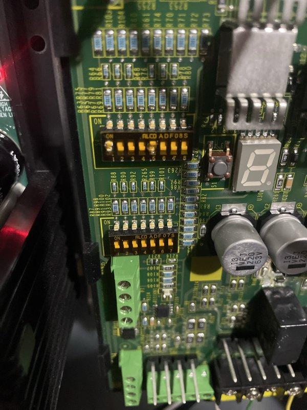 Responded to a complaint of an unusual thumping noise during furnace shutdown on a 2-year-old unit. Inspected the control compartment and main control board, verifying DIP switch configuration, wiring connections, and component condition, and found no signs of burn damage, corrosion, or loose terminals. System operation was checked through the shutdown cycle to confirm proper performance.