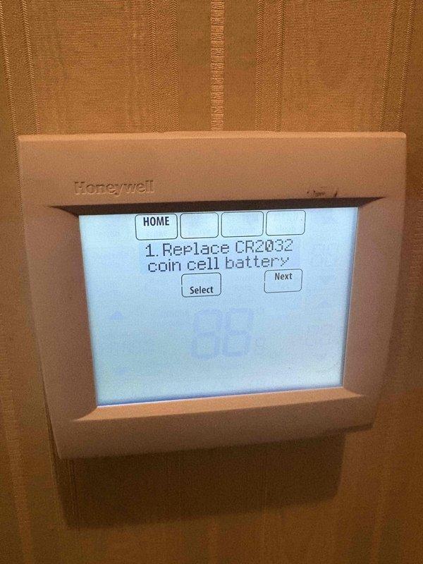 Responded to a no-heat call on an American Standard furnace and found the Honeywell wall thermostat displaying "Replace CR2032 coin cell battery" and "Thermostat is not communicating" fault messages, indicating a depleted thermostat battery was interrupting communication with the furnace control. Replaced the CR2032 battery, restoring thermostat power and communication so the furnace can receive heat calls.